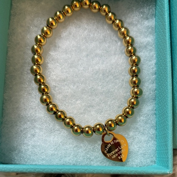 Tiffany & Co. Jewelry - Tiffany & Co. Gold Beaded Bracelet with Heart Charm